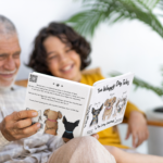 copy-of-mockup-of-a-happy-senior-man-reading-a-book-to-his-grandson-m39439